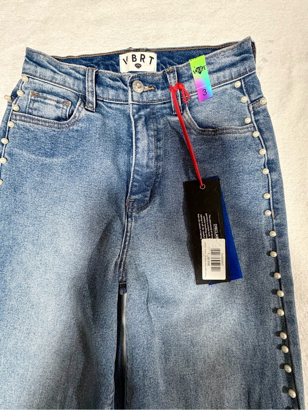 VBRT High-Rise Light Blue Pearl-Trim Wide Leg Jeans
Size 3